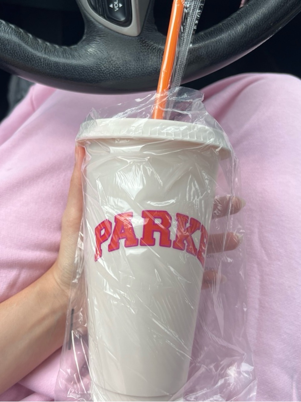 Parke Dunkin White Cream Tumbler with Pink and Red Logo and Orange Straw